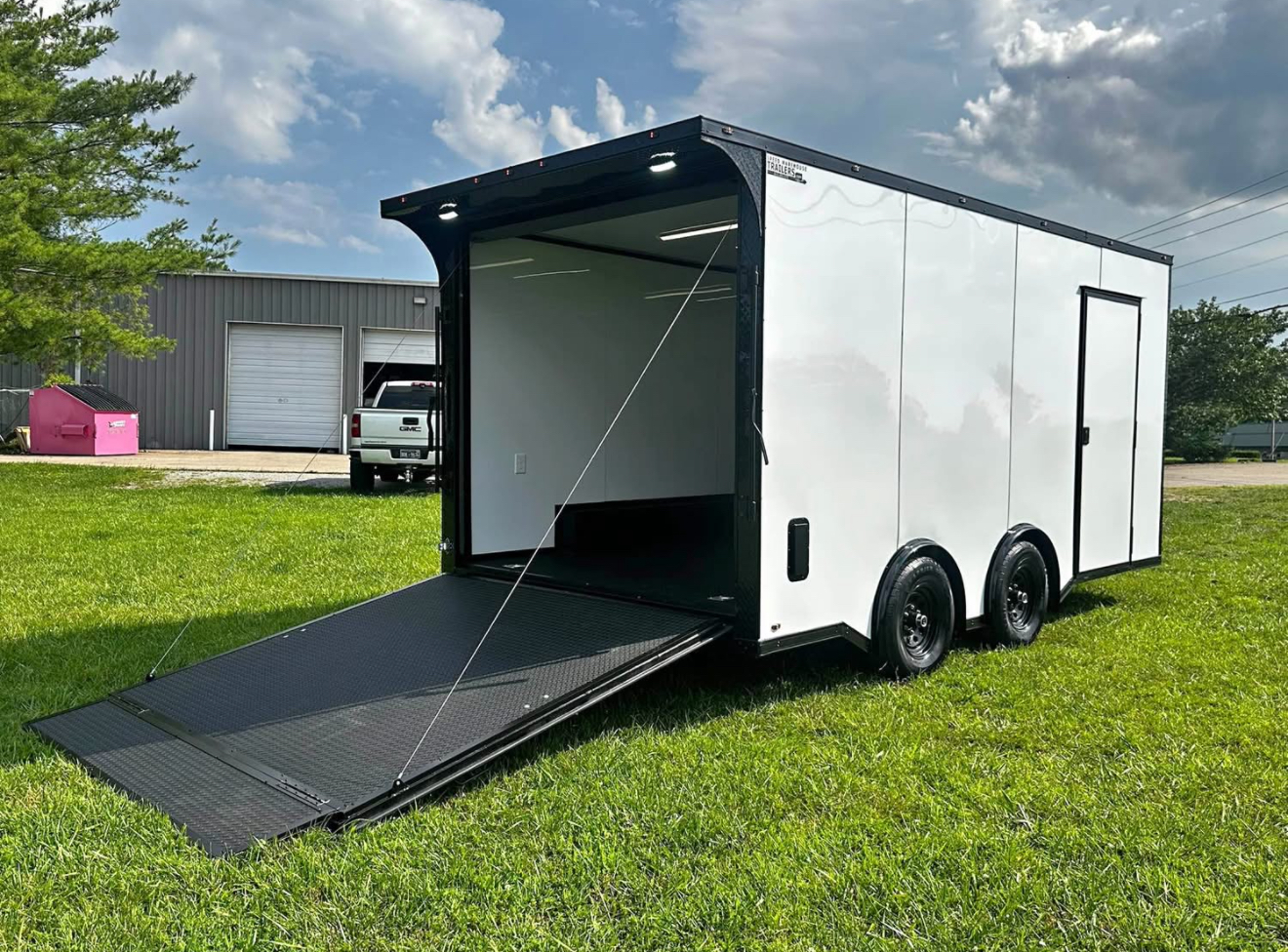 Enclosed cargo trailer interior with ramp open