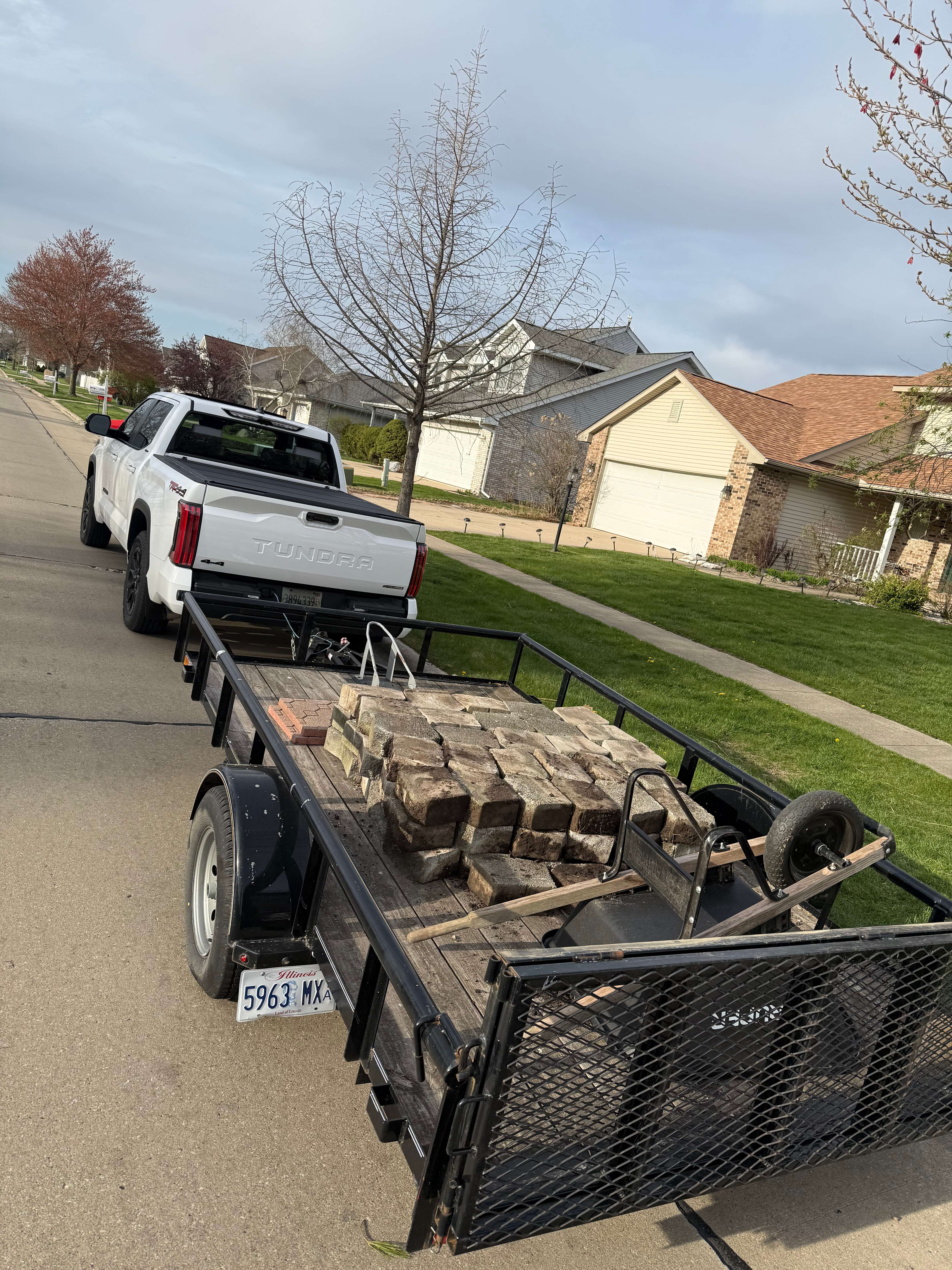 Utility trailer being towed